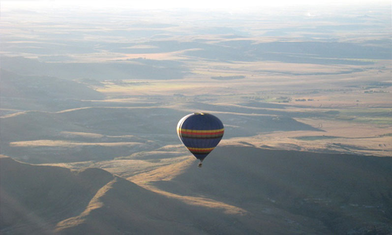 Flying over the mountains of Clarens in a hot air balloon.