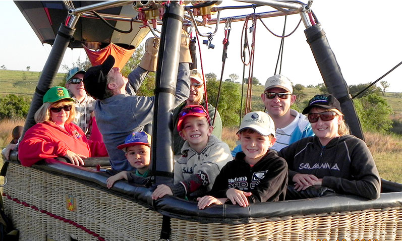 Family group in a balloon basket on the Drakensberg route